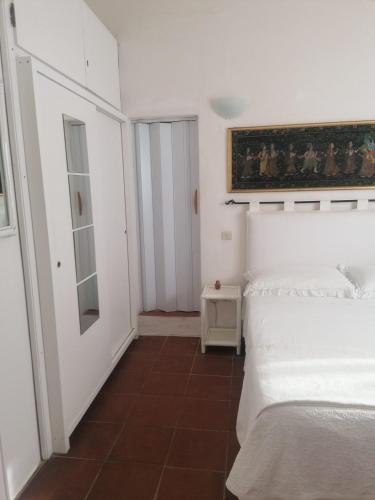 Cama o camas de una habitación en Dalla Manu 1/2