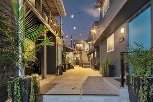 a hallway of a building with plants and lights at Tower 9 #1 in Oceanside