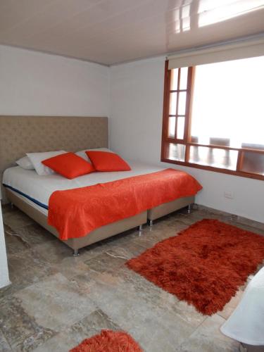Katil atau katil-katil dalam bilik di Hotel La Candelaria