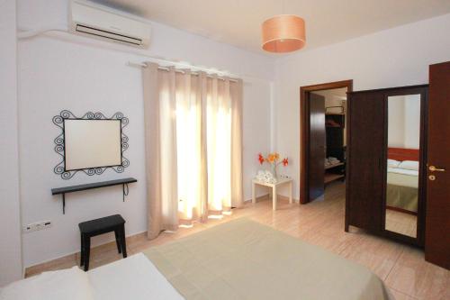 Letto o letti in una camera di Kallisti Apartments