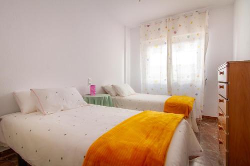 Postel nebo postele na pokoji v ubytování Siscar Apartment Altea