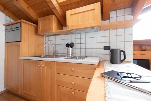 Kuchyň nebo kuchyňský kout v ubytování Chalet Vedig