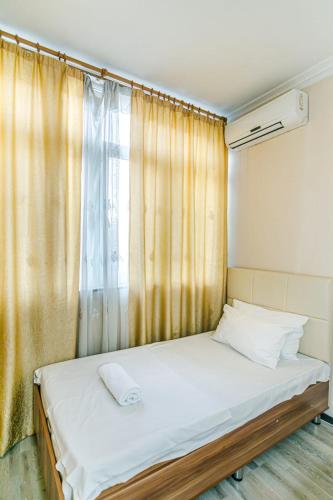 Säng eller sängar i ett rum på NEM McDonald s 2 bedroom Apartment
