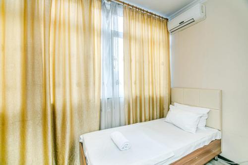 Säng eller sängar i ett rum på NEM McDonald s 2 bedroom Apartment