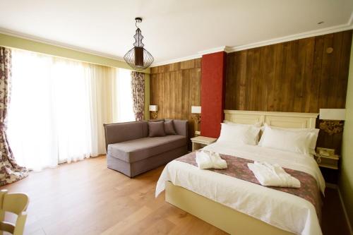 Postel nebo postele na pokoji v ubytování Irene's Resort