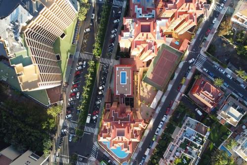 an aerial view of a city with cars at A piece of paradise in Puerto de la Cruz in Puerto de la Cruz
