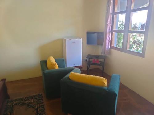 Posezení v ubytování Sea Breeze Self Contained Rooms