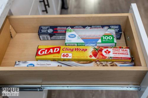 a wooden box with food items in it at Boho Suite - Long Stays - King Bed - Fireplace & WiFi in Edmonton