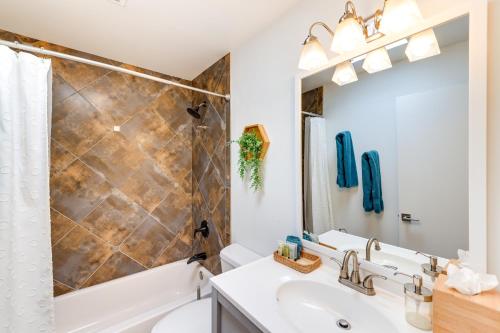 a bathroom with a sink and a shower at 1 Mi to Old Town! Snowbird Escape with Pool Access in Scottsdale