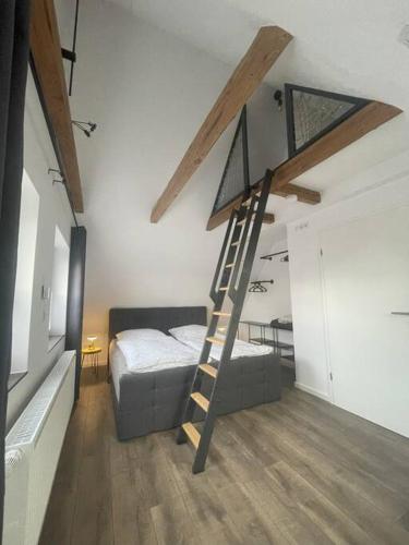 Postel nebo postele na pokoji v ubytování GRYT Home - FeWo XXL - Nähe Nordsee