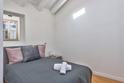 Кровать или кровати в номере [Duomo-Porta Torre] Penthouse with Private Terrace