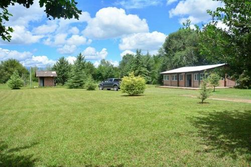 En have udenfor Los Nidos Dormis Habitaciones con baño privado y DEPARTAMENTOS