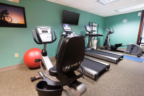 a gym with tread machines and a treadmill at Drury Inn & Suites Houston Galleria in Houston