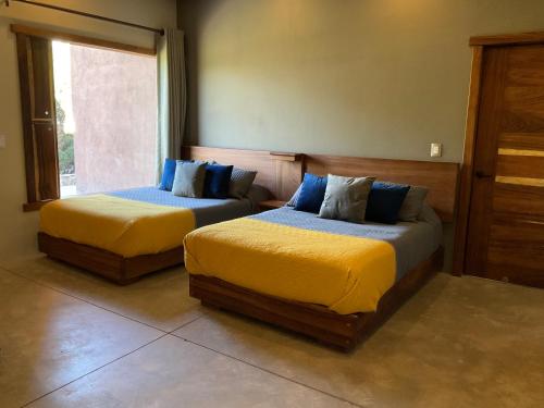 Katil atau katil-katil dalam bilik di Rincón de Paz
