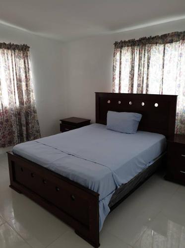 En eller flere senge i et værelse på Villa Lucy del Mar