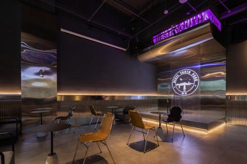 Hangzhou Desti Youth Park Hostel West Lakeにあるシーティングエリア