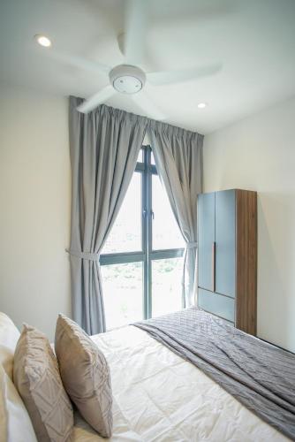 Ένα ή περισσότερα κρεβάτια σε δωμάτιο στο Neu Suites Ampang near LRT Jelatek