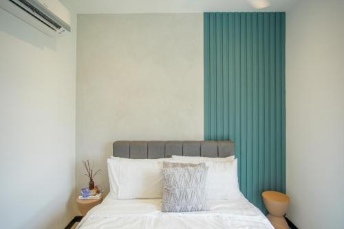 Ένα ή περισσότερα κρεβάτια σε δωμάτιο στο Neu Suites Ampang near LRT Jelatek