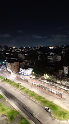 a view of a city at night with a street at Apartamento 1 Quarto No Centro para até 2 pessoas in Salvador