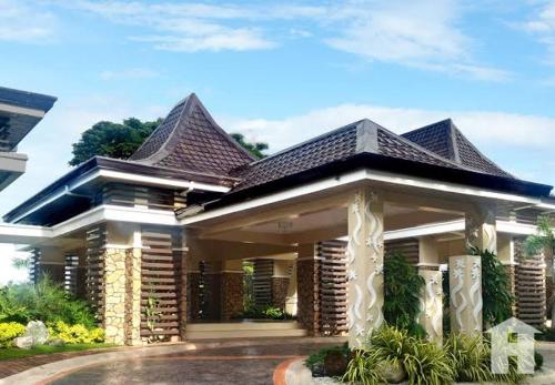 a house with a roof on top of it at Hanalei homes robinsons home laoag city ilocos norte in Bangued