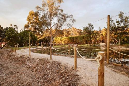 a rope tied to a fence in a park at Eight Acres Lakes Entrance in Lakes Entrance