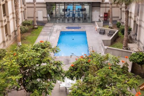 an overhead view of a swimming pool in a building at Holiday Inn Express - Iquique by IHG in Iquique