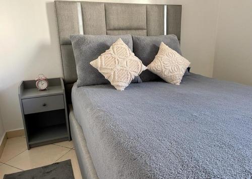 Postel nebo postele na pokoji v ubytování appartement chams