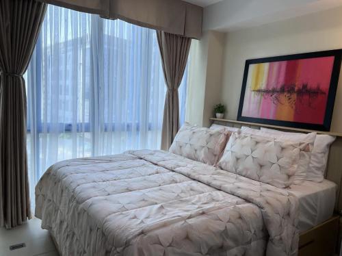 Postel nebo postele na pokoji v ubytování 38 Park Avenue Condominium Cebu IT Park - Unit Freyja