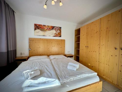 Säng eller sängar i ett rum på Apartment Kitzsteinhorn