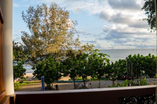 a view of the ocean from a balcony at New Golden Bay Resort Weligama in Weligama
