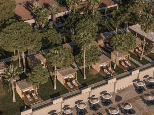 an overhead view of a resort with palm trees at Balmy Beach Resort Kemer in Kemer