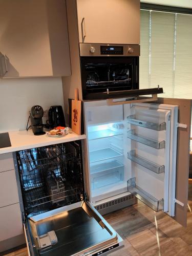 Dapur atau dapur kecil di Vakantiewoningen Eyveld
