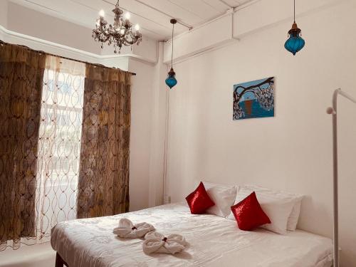 En eller flere senge i et værelse på Mandala Beach Villa Jomtiean