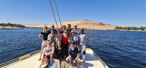 a group of people on a boat on the water at La Terrace in Aswan
