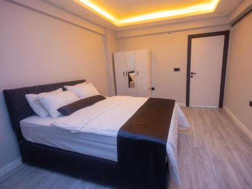 En eller flere senge i et værelse på PAMELA SUİT APART