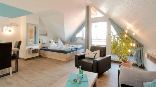 Postel nebo postele na pokoji v ubytování Lüerßen direkt am Steinhuder Meer