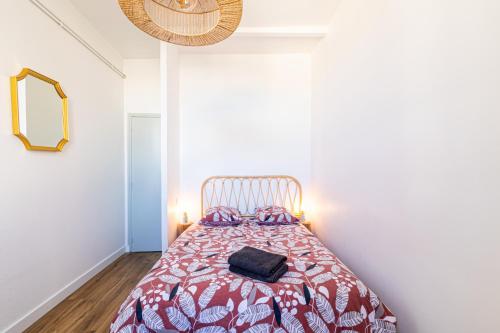 מיטה או מיטות בחדר ב-Blanca - Hyper centre très cosy