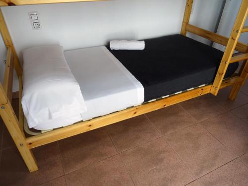 a bunk bed sitting in a room with at Center Plaza Figueres in Figueres