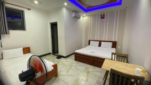 Cama o camas de una habitación en Motel Quốc Việt