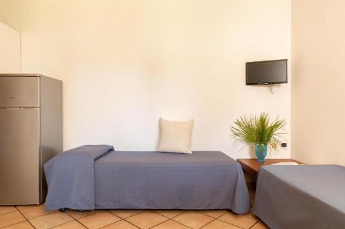 Letto o letti in una camera di Gitavillage Argentario