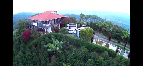 a house with a van parked in front of it at El Filito in San JosÃ©