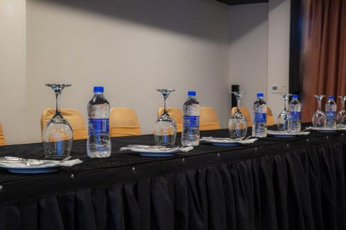 a table with bottles of water on top of it at Tiger Palace By Soaltee in Bhairāhawā