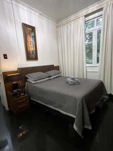 Postel nebo postele na pokoji v ubytování Copacabana Apartamento