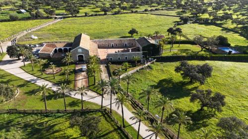 an aerial view of a house in a field at Alojamiento Rural Finca Barral in Seville