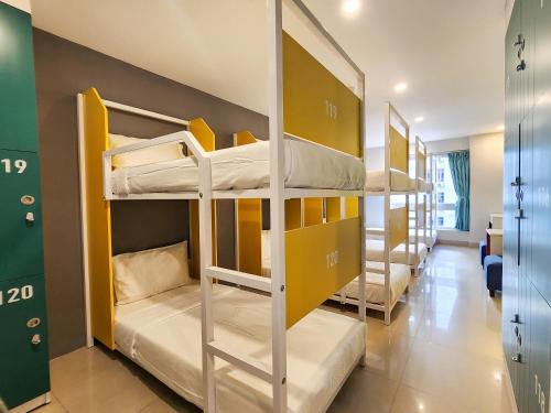 a group of bunk beds in a room at FUSE Nha Trang in Nha Trang