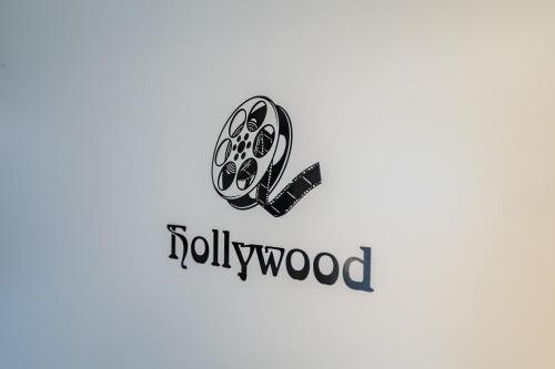 a logo for the rolling wood company at Oma's Küche & Quartier in Binz