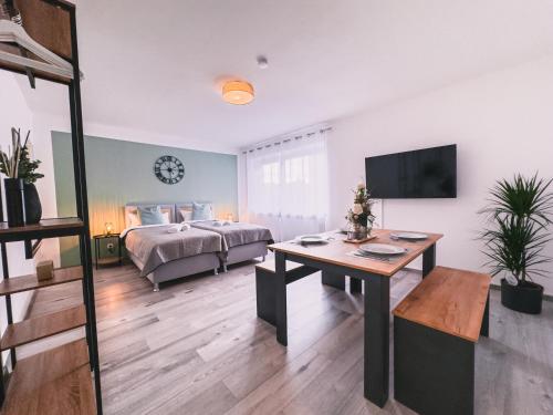 Et tv og/eller underholdning på ImmoStay City Apartments - Modern & WiFi