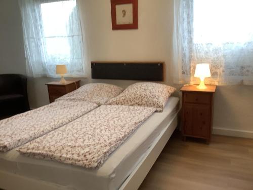 Ένα ή περισσότερα κρεβάτια σε δωμάτιο στο Zimmer Wolkenlos
