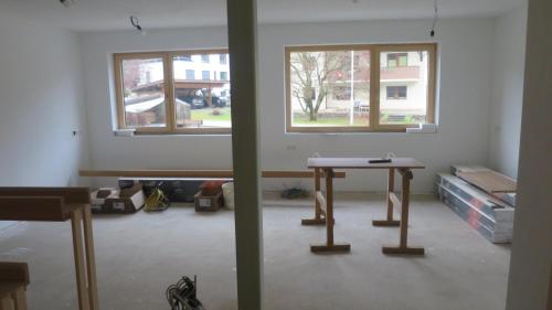 a room with a table and two windows at Ferienhaus & -wohnung Flatscher in Waidring