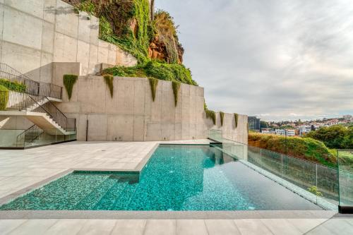 a swimming pool on the roof of a building at Vista Verde Apartment by Amazing Madeira in Funchal